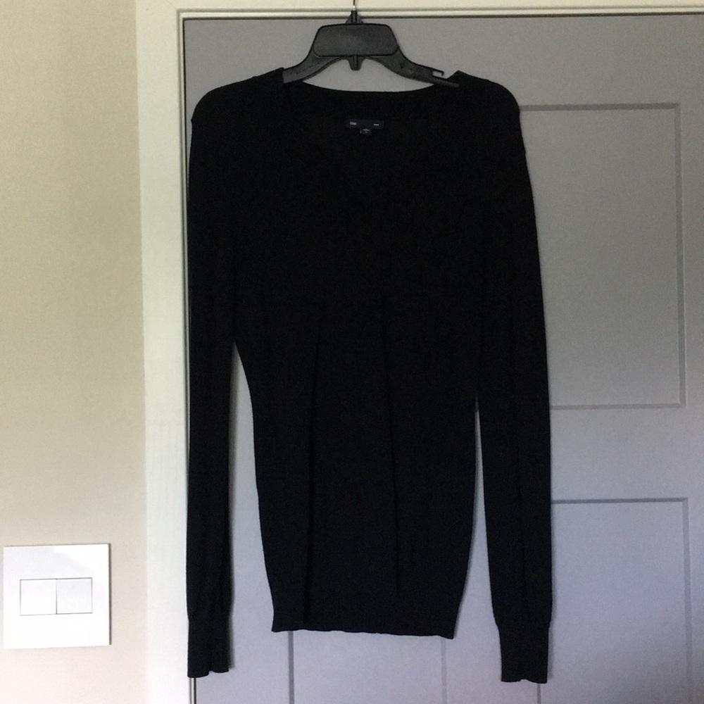 Black sweater, good condition.